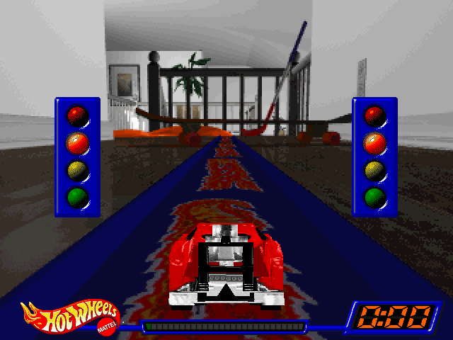 Hot Wheels Stunt Track Driver: the car on the starting line of a track laid through a house, its lights on red